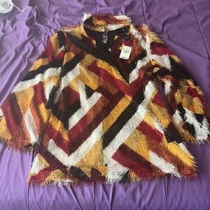 An Ashley Stewart blouse, in a size 18/20 and in the color sunflower🥰